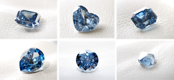 Verschieden geformte und geschliffene blaue Diamanten